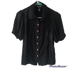 A black short sleeve button down shirt from Hot Topic